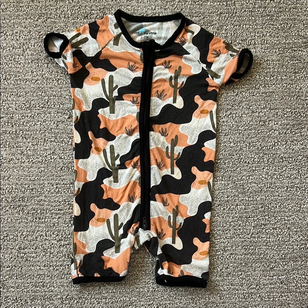 Black and Orange Bodysuit with Artistic Pattern